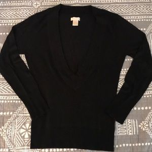 Deep v-neck black sweater. Juniors large. GUC